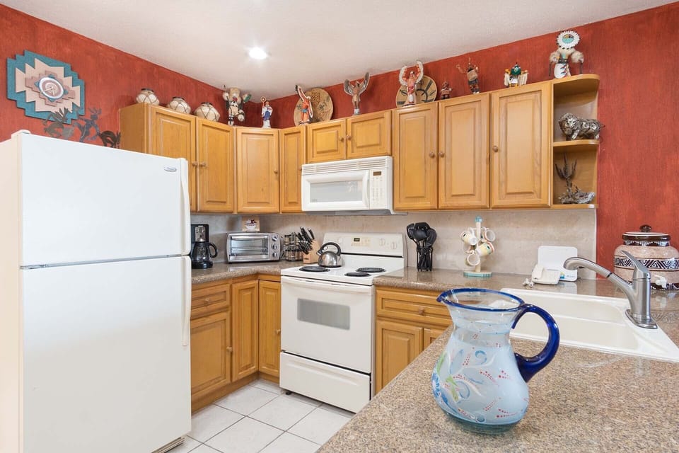the kitchen has a large counter top