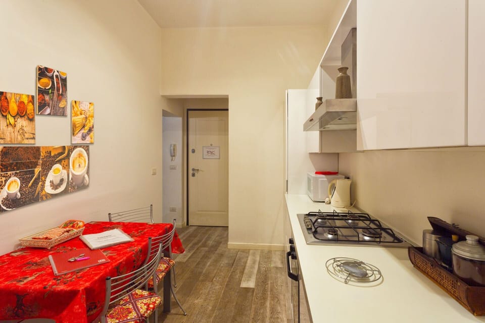 Apartment, 1 Bedroom | Private kitchen | Full-size fridge, stovetop, coffee/tea maker, electric kettle