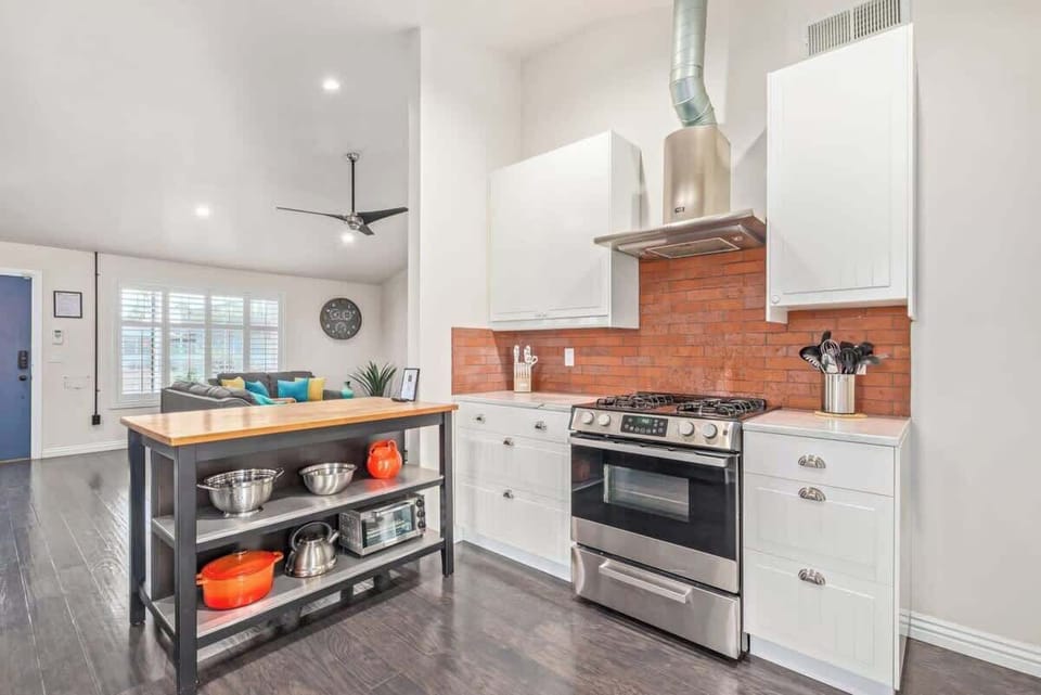 Updated modern Kitchen with real brick and stainless steel appliances