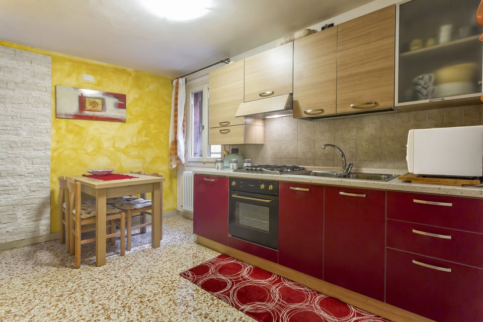 Apartment, 2 Bedrooms | Private kitchen | Full-size fridge, stovetop, cookware/dishes/utensils