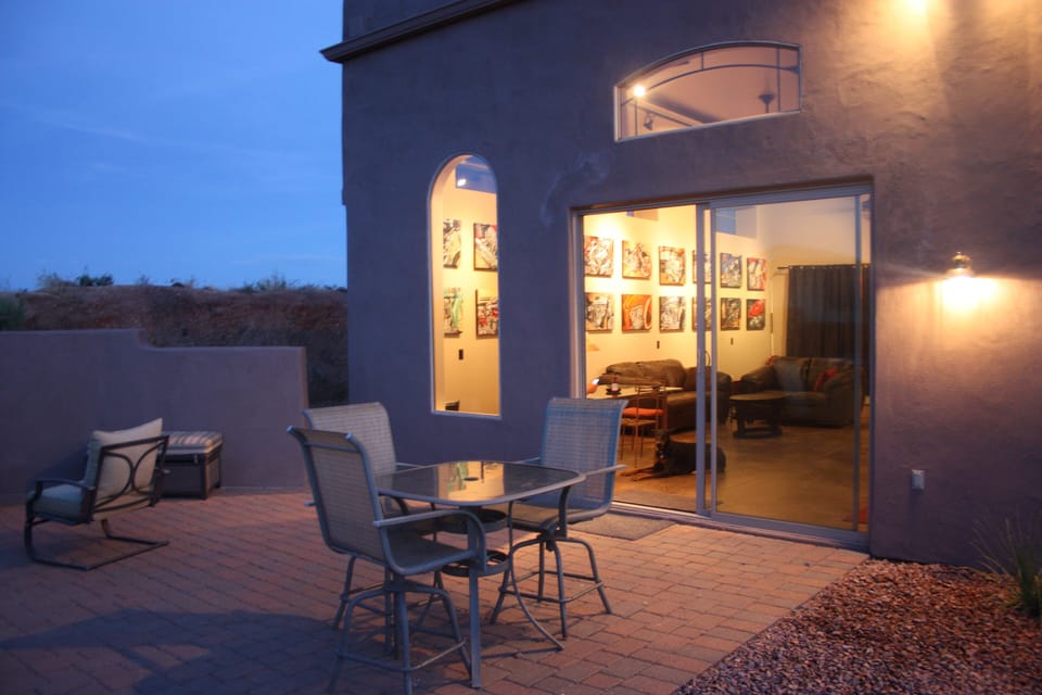 900 sq ft outside patio with plenty of seating. Fenced in dog area.