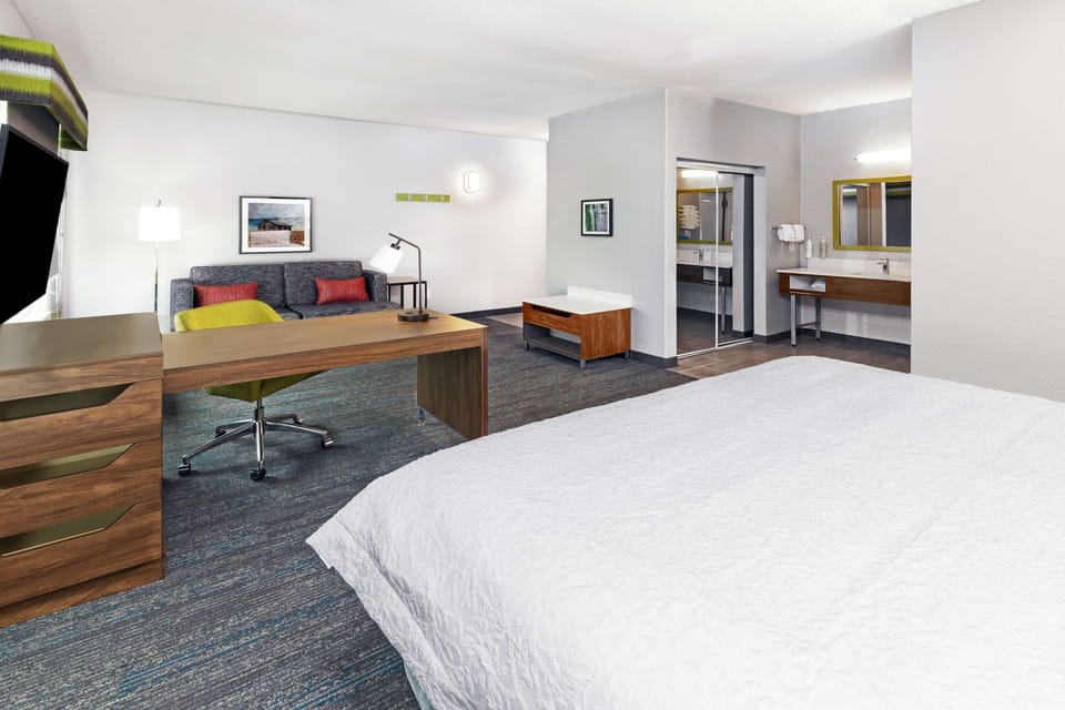Suite, 1 King Bed, Non Smoking | In-room safe, desk, iron/ironing board, cribs (free)