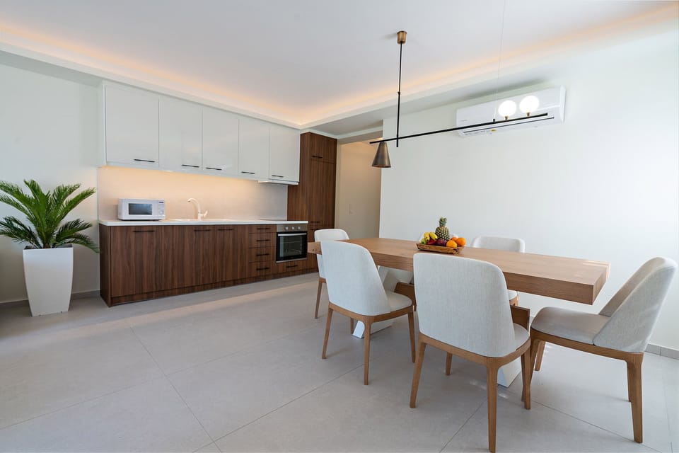 Fully equipped kitchen with wine cooler.