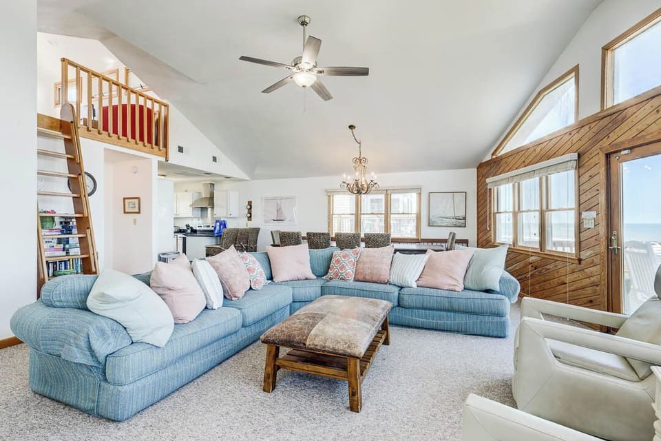 Top-Level Living Room with Deck Access