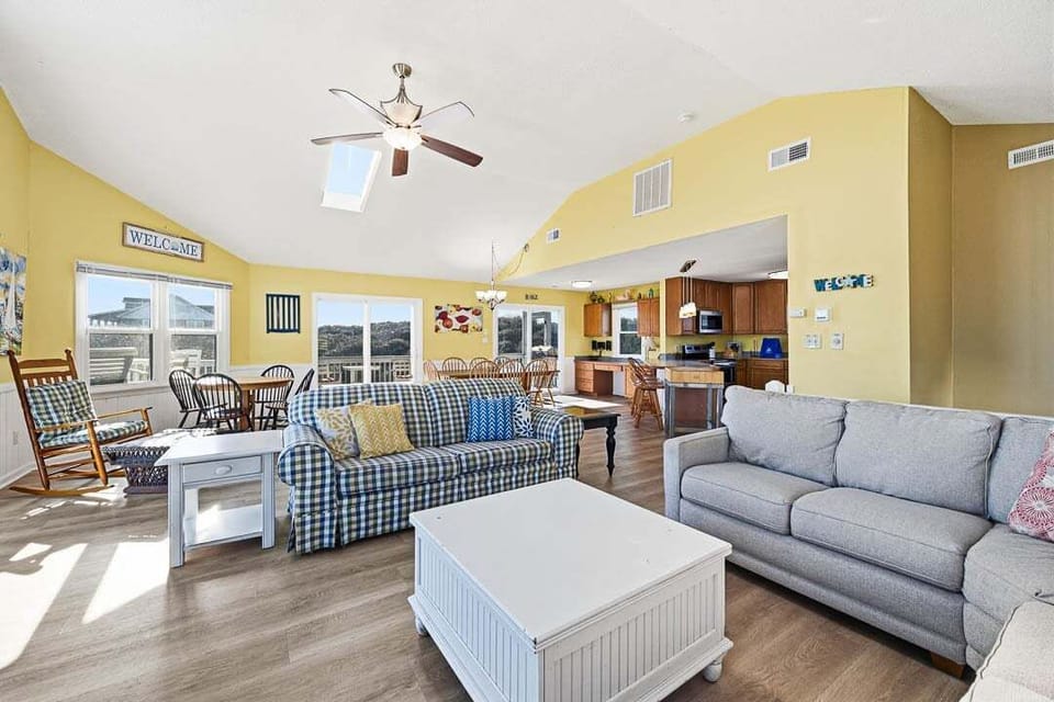 Top-Level Living Room with Deck Access