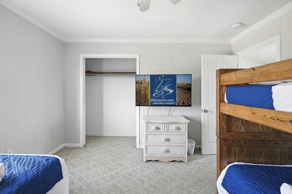 Top-Level Bedroom with Bunk Bed and Twin Bed