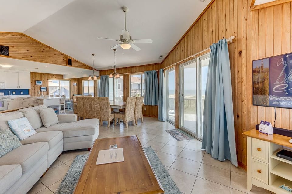Top-Level Living Room with Deck Access