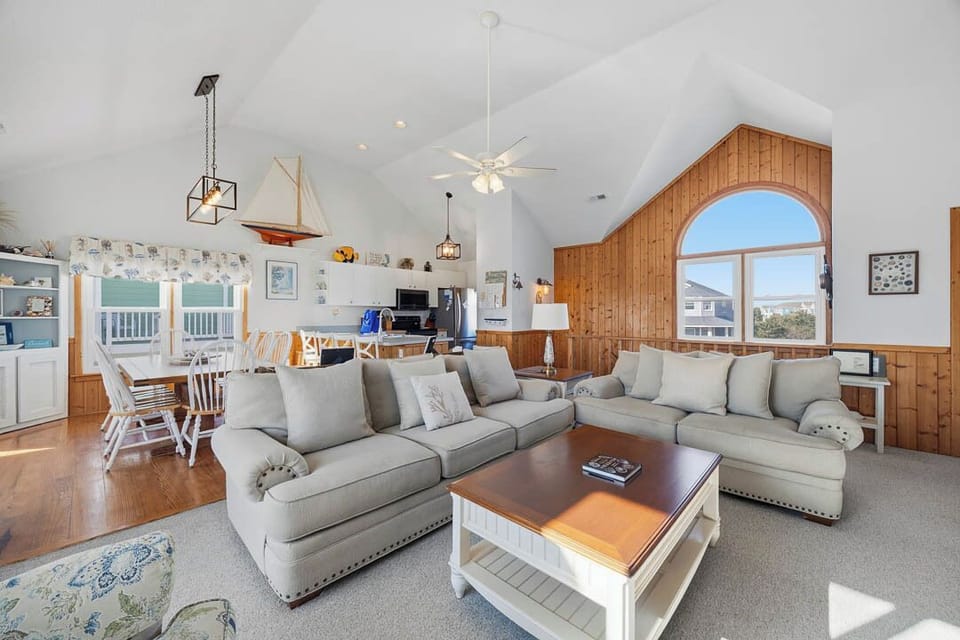 Top-Level Living Room with Deck Access