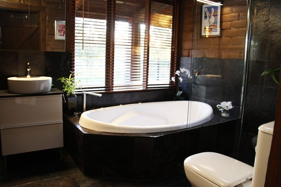 Spa Bathroom attached to King suite (Bedroom 1) through walk in robe