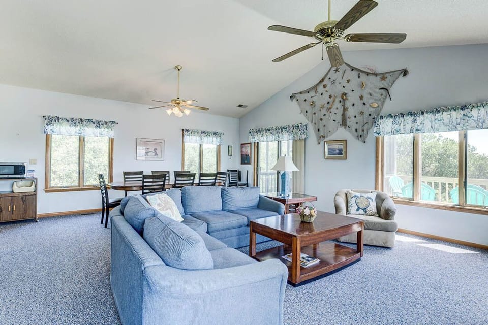 Top-Level Living Room with Deck Access