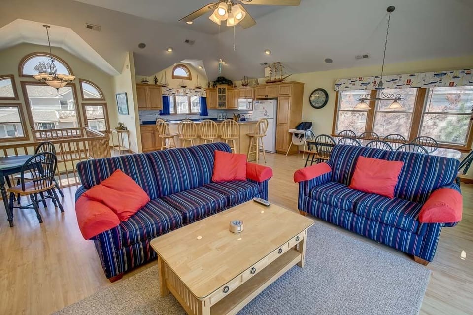 Top-Level Living Room with Deck Access ** The high chair seen in photos is no longer at the property. If baby equipment is needed local rental options can be provided. **