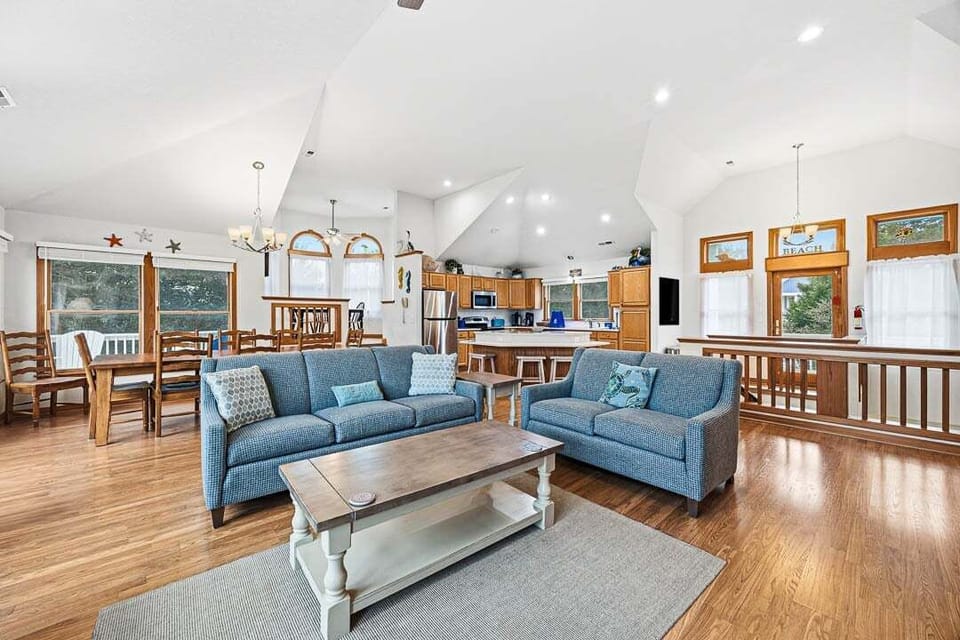 Top-Level Living Room with Deck Access