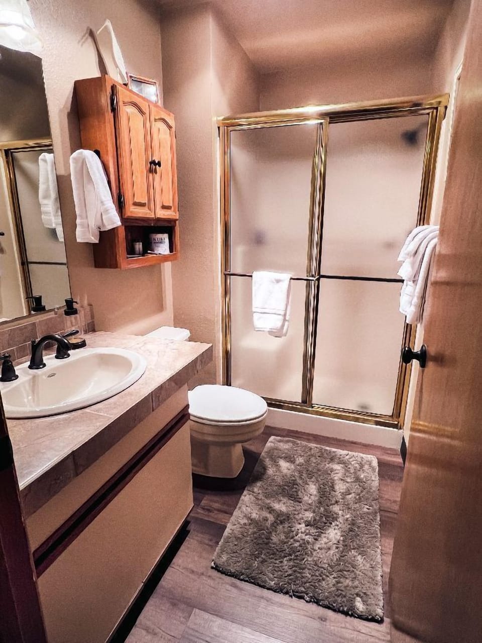 Hall bath with a walk in shower