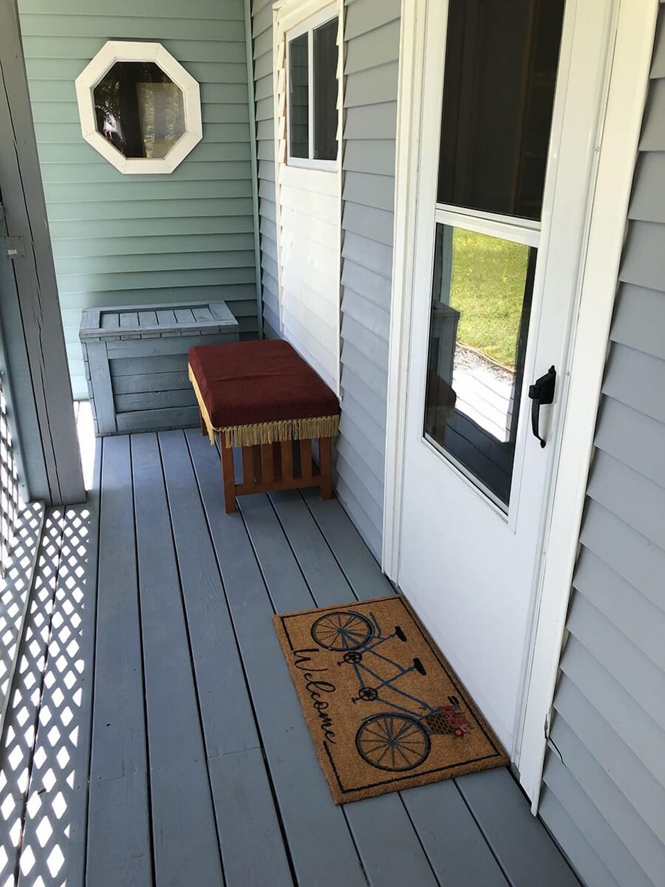 Guests enter through front porch. There are no steps. (August Smart Lock)