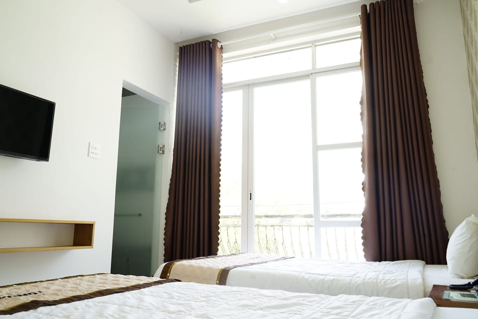 Standard Triple Room, Balcony, Garden View | Street view