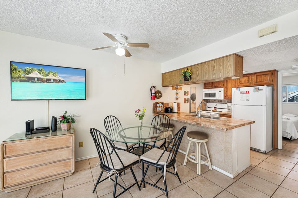 Enjoy meals together in the welcoming dining area with easy access to the kitchen and living space.