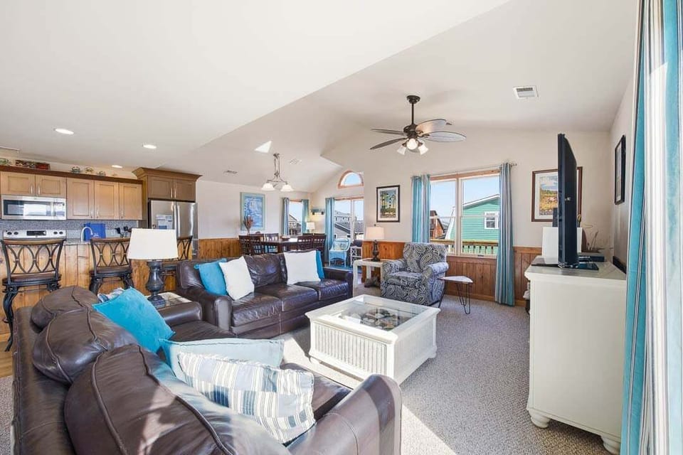 Top-Level Living Room with Deck Access