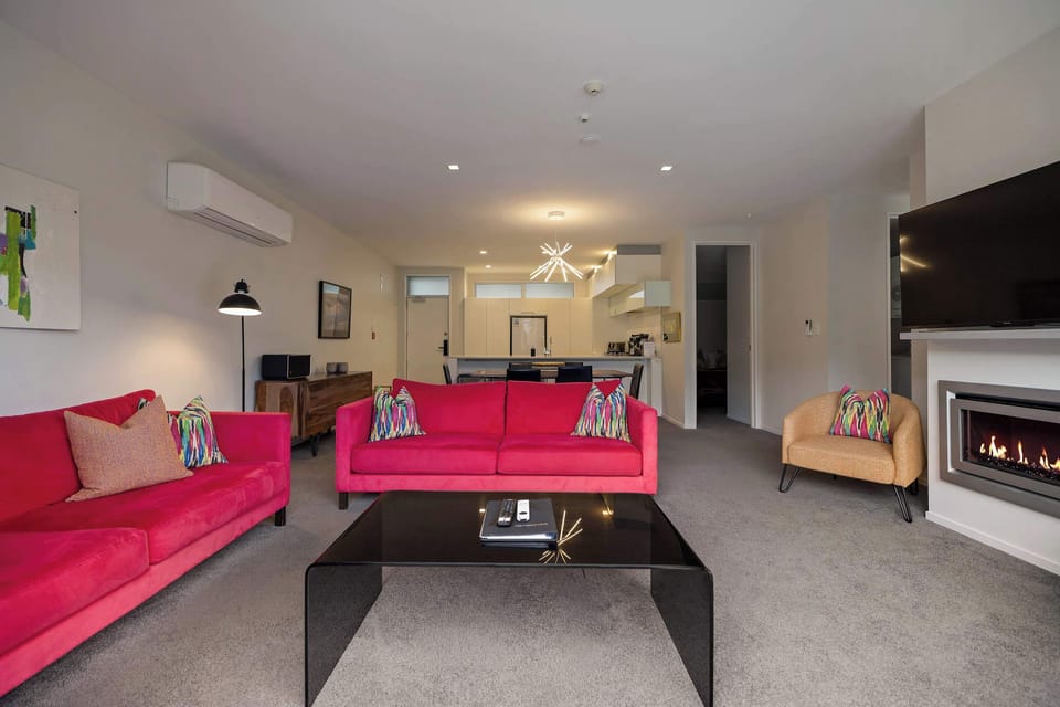 Open plan living and dining area with gas fire