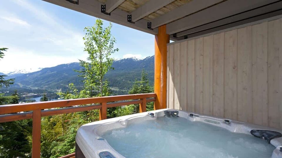 - Private hot tub on the deck overlooking panoramic mountain views  
- Perfect spot to unwind under the stars after a day of adventure  
- Relax as you soak in warmth surrounded by alpine beauty  
