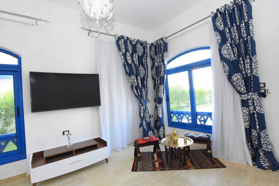 Oriental seating area with Egyptian cushions and rug 