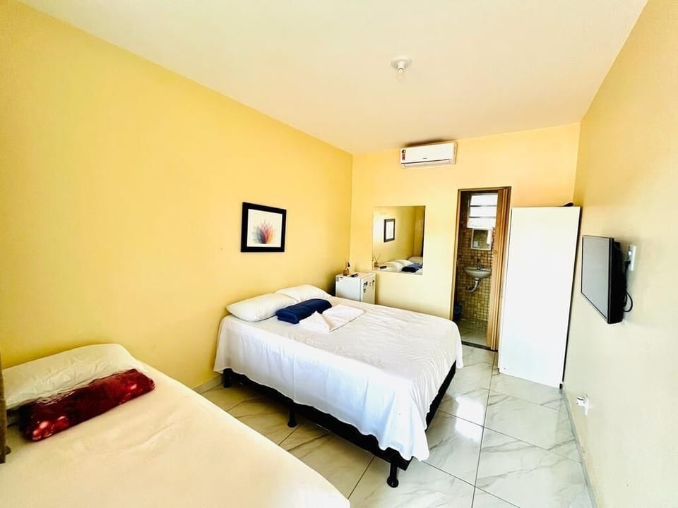 Triple Room | Blackout drapes, free WiFi, bed sheets