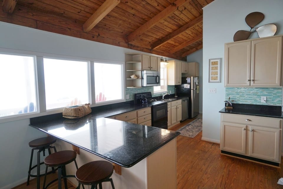 Fully Equipped Kitchen with Bar Area