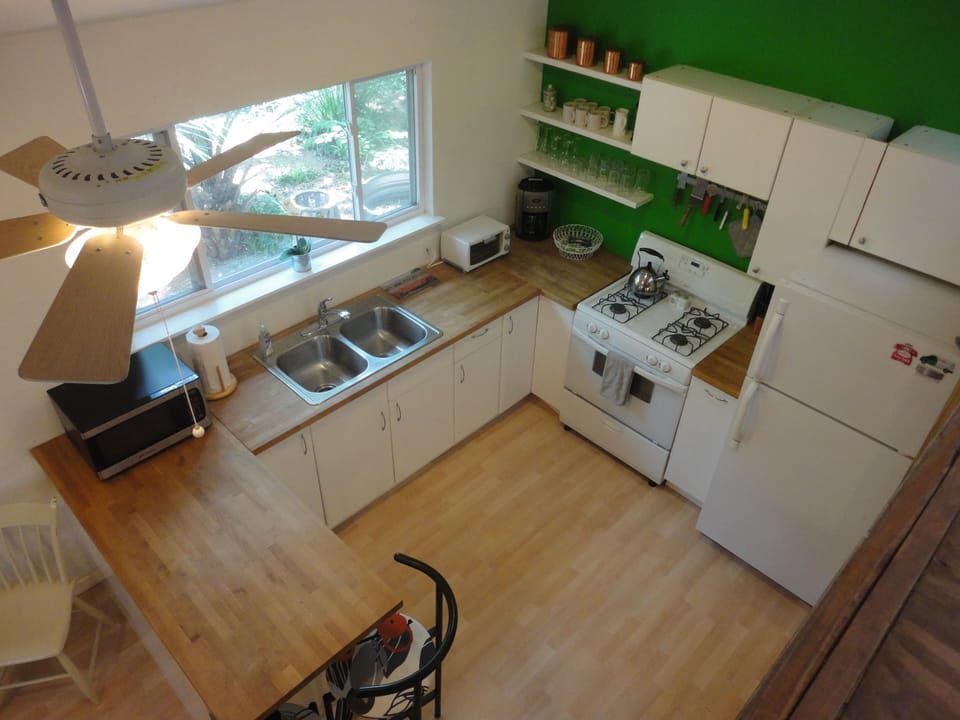 View of kitchen from loft.