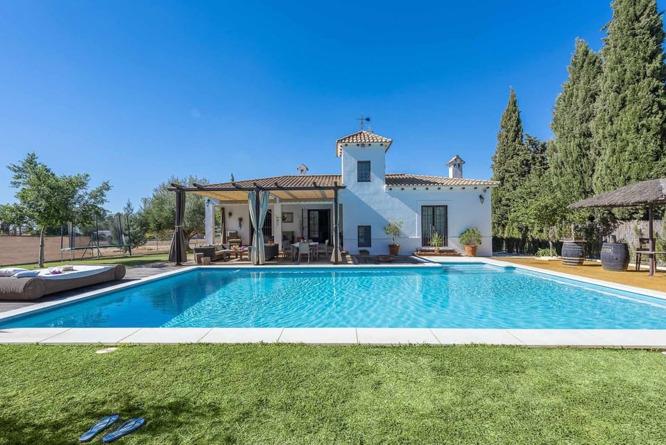 Property building,BBQ facilities,Garden,Pool view,Swimming pool