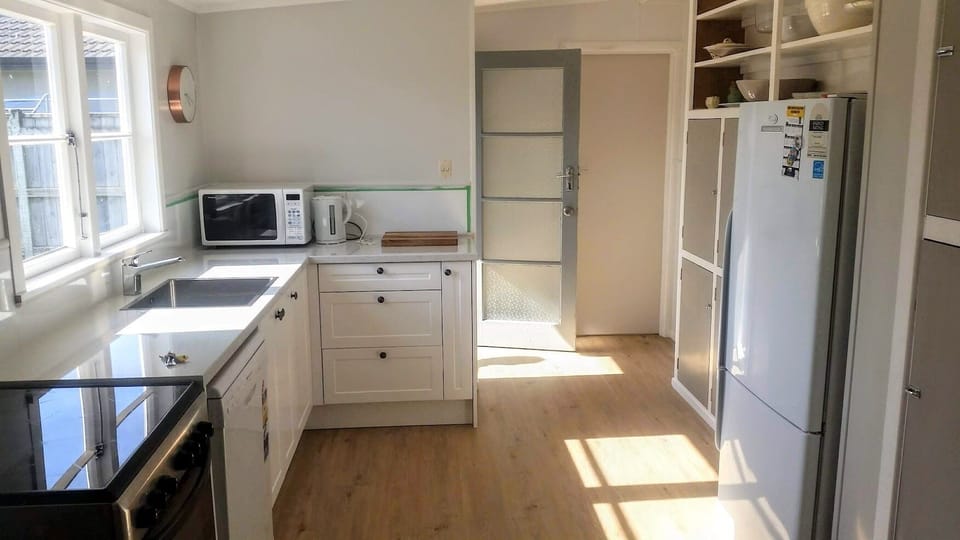 Kitchen looking toward back door.