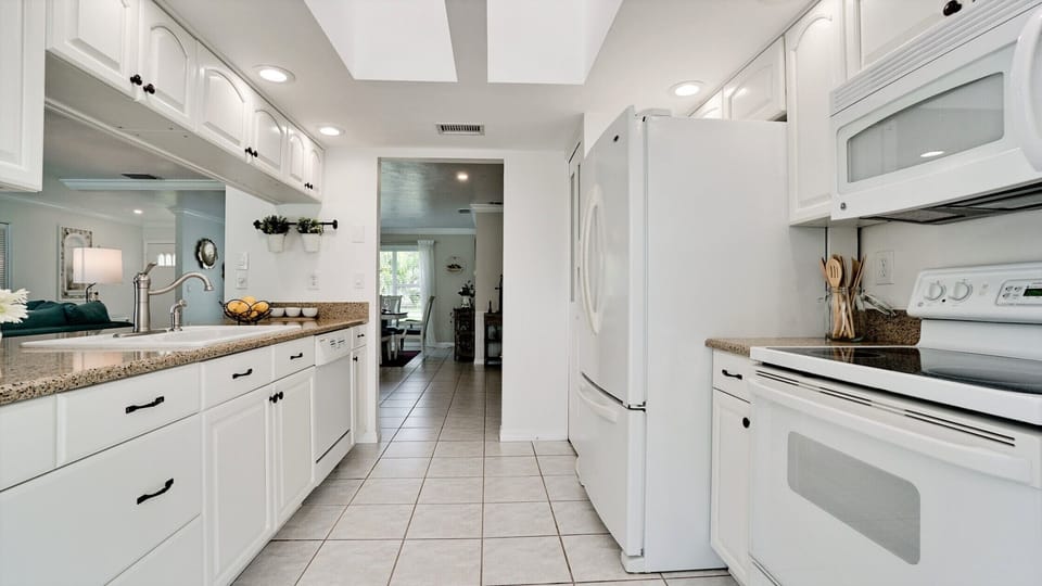 Kitchen provides appliances for all your cooking needs and a dishwasher.