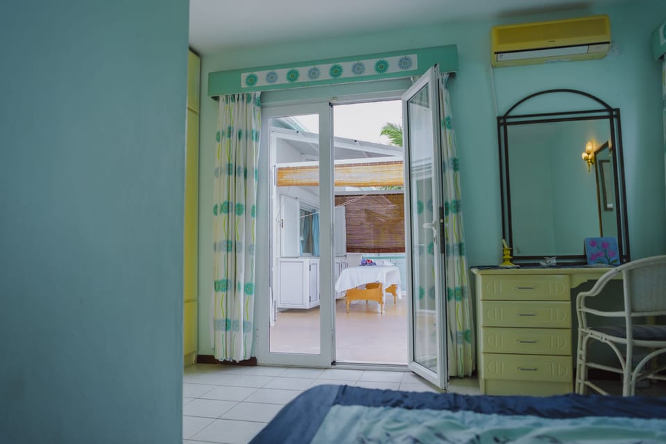 Deluxe Villa (Danielle) | In-room safe, desk, laptop workspace, iron/ironing board