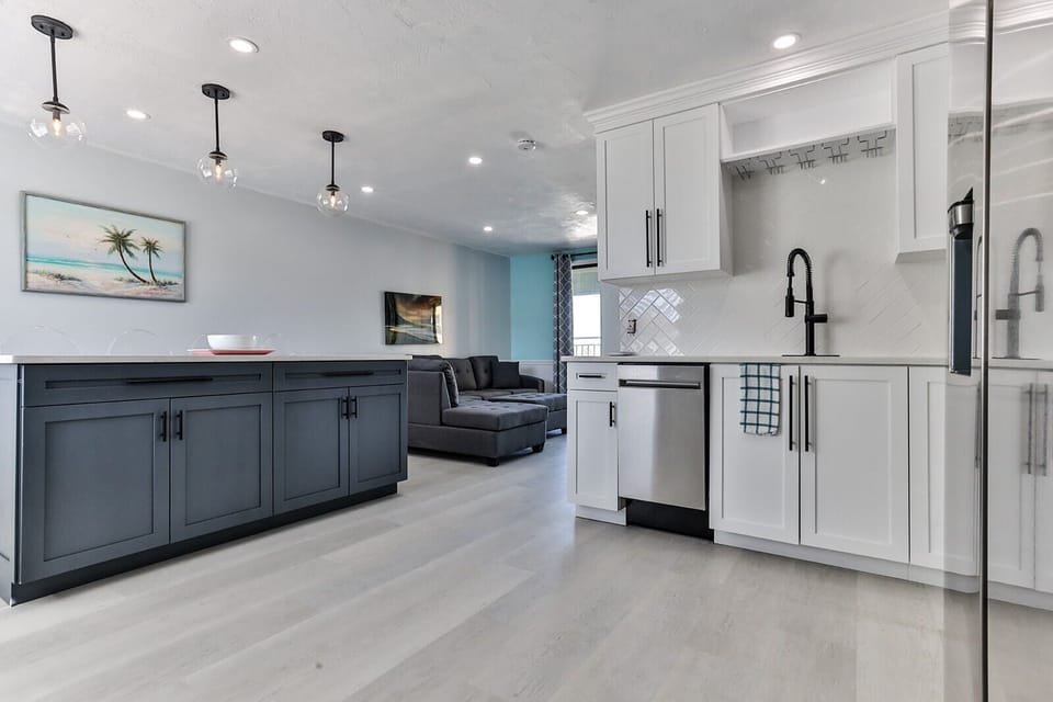Deluxe Condo | Private kitchen | Coffee/tea maker, fridge, microwave, dishwasher
