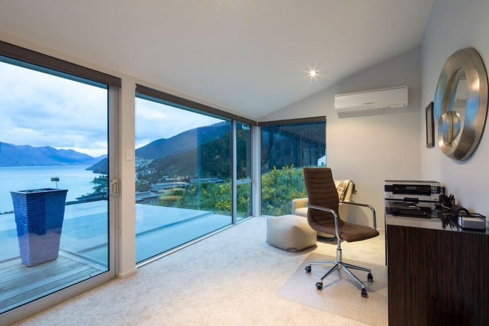 The spacious master with seating area, desk, private balcony, ensuite and walk-in-wardrobe.