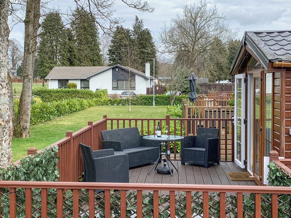 Decking and sreened hot tub area | Bridge End Lodge, Dollar, near Stirling