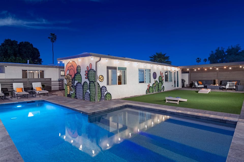 The backyard is made for enjoying. Heated pool, lounge seating and firepit.