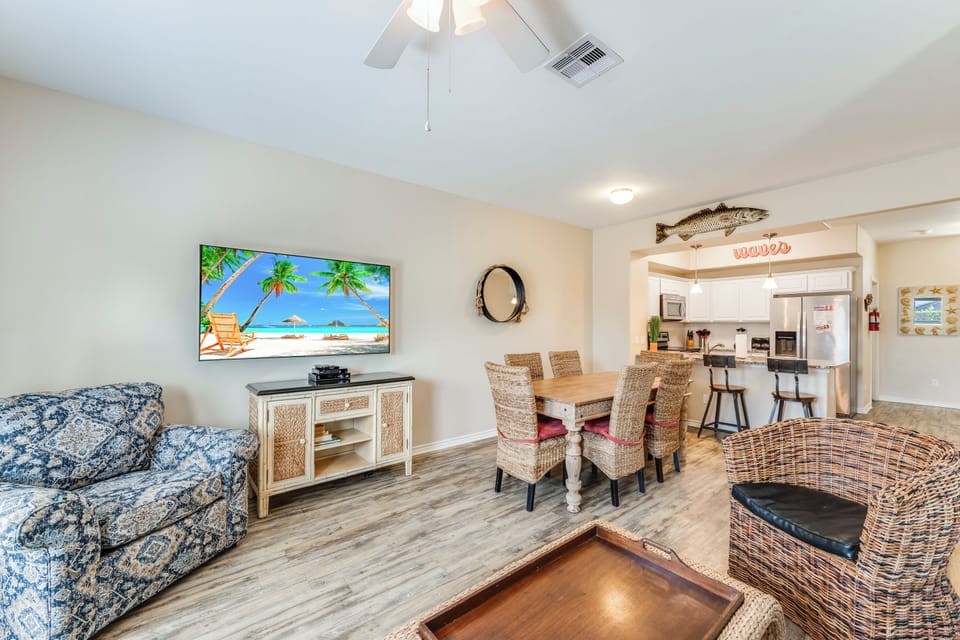 Your spacious open-plan living area flows seamlessly into the fully equipped kitchen, perfect for relaxing evenings and memorable meals together.
