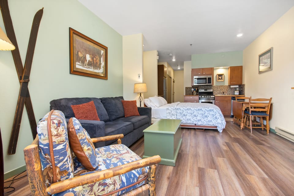 Murphy bed shown down. Flexibility to expand living area during the day! 