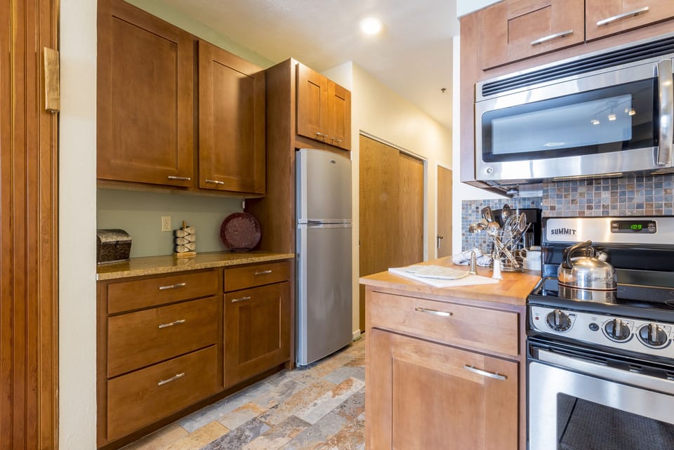 Plenty of Room in the Refrigerator, Cabinets and Large Closet 