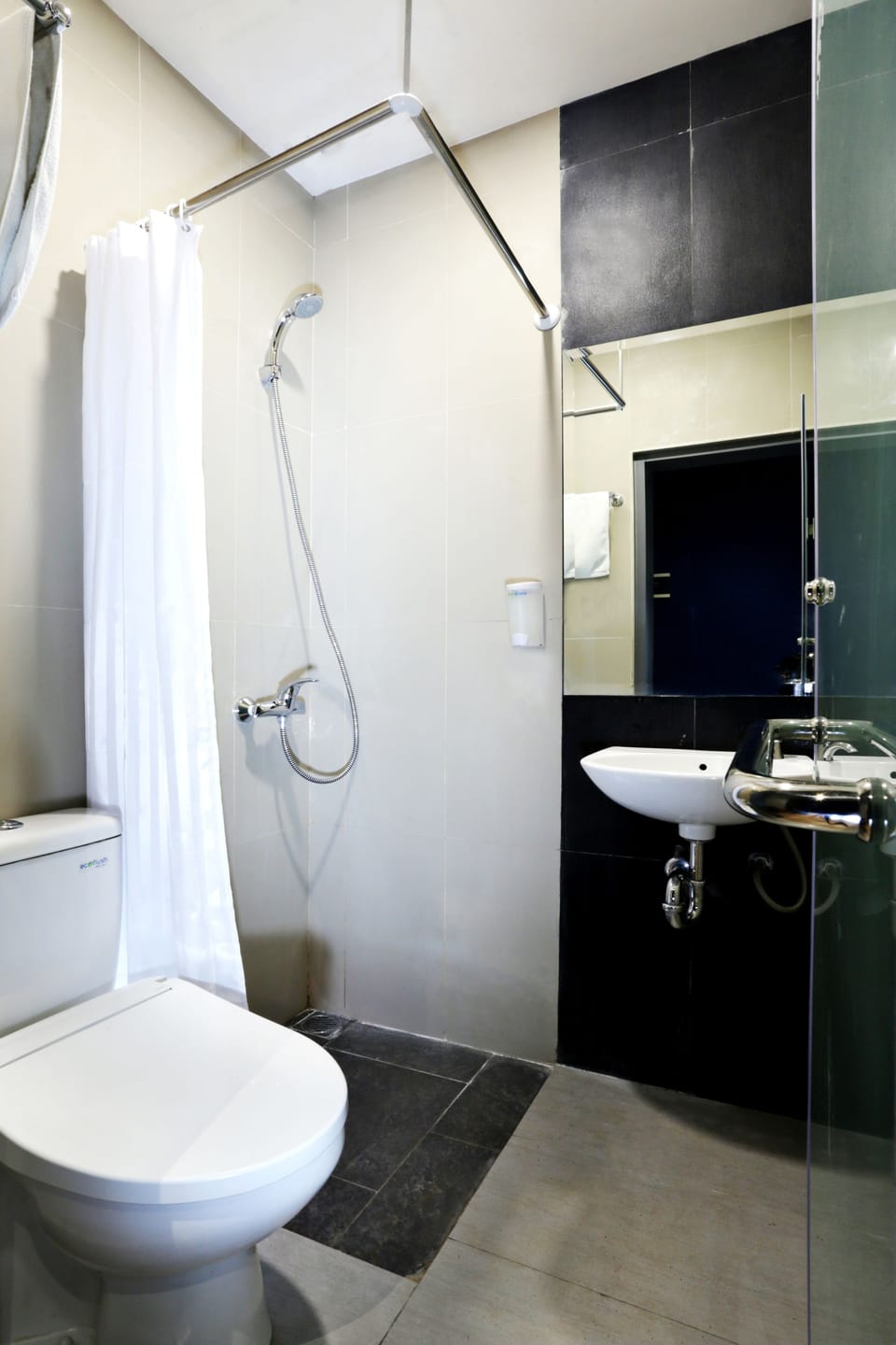 Shower, free toiletries, slippers, soap