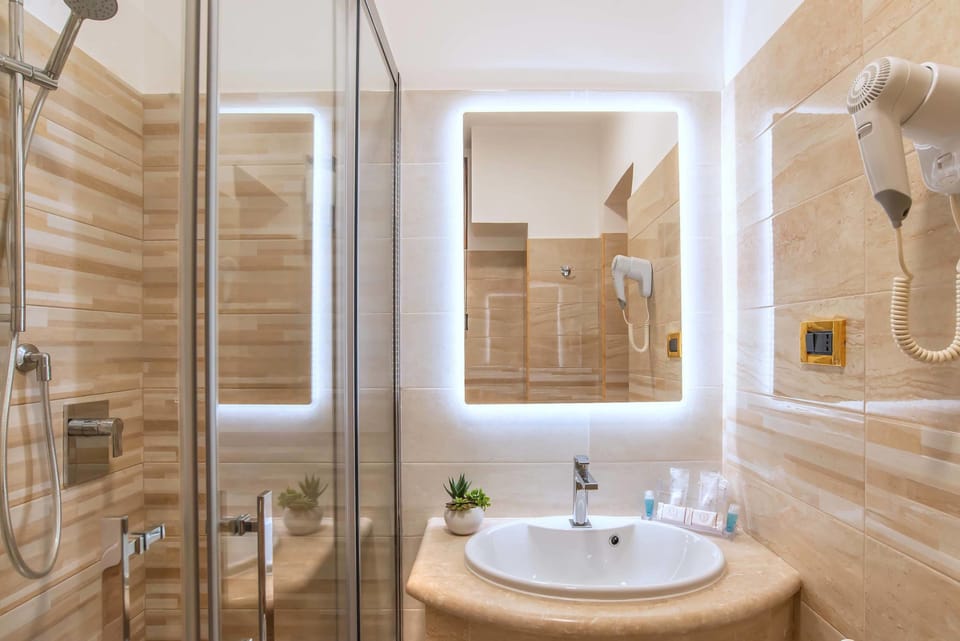 Bathroom | Shower, hair dryer, bidet, towels