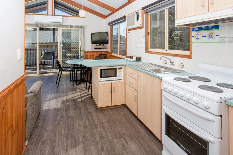 Three Bedroom Villa | Private kitchen | Fridge, microwave, coffee/tea maker, electric kettle