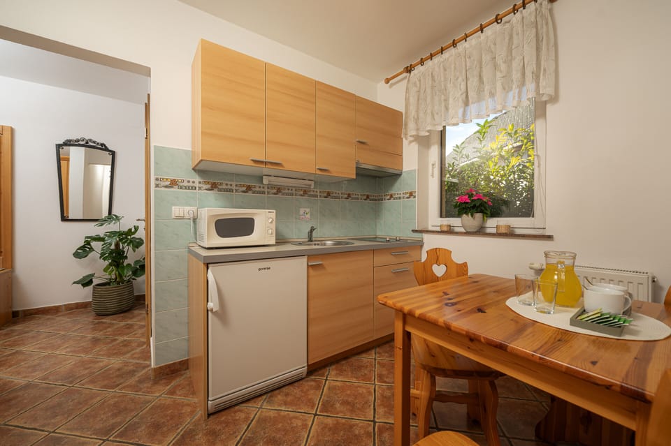 Comfort Studio Suite, 1 Bedroom, Non Smoking, Balcony | Private kitchen | Mini-fridge, electric kettle, highchair