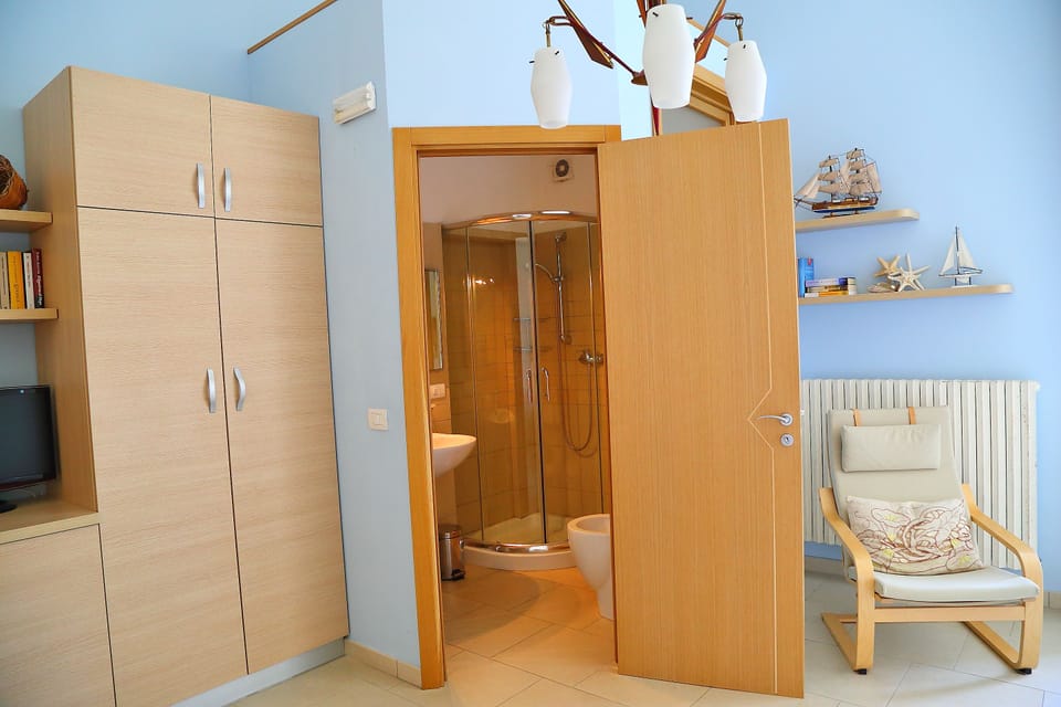 Shower, rainfall showerhead, hair dryer, bathrobes