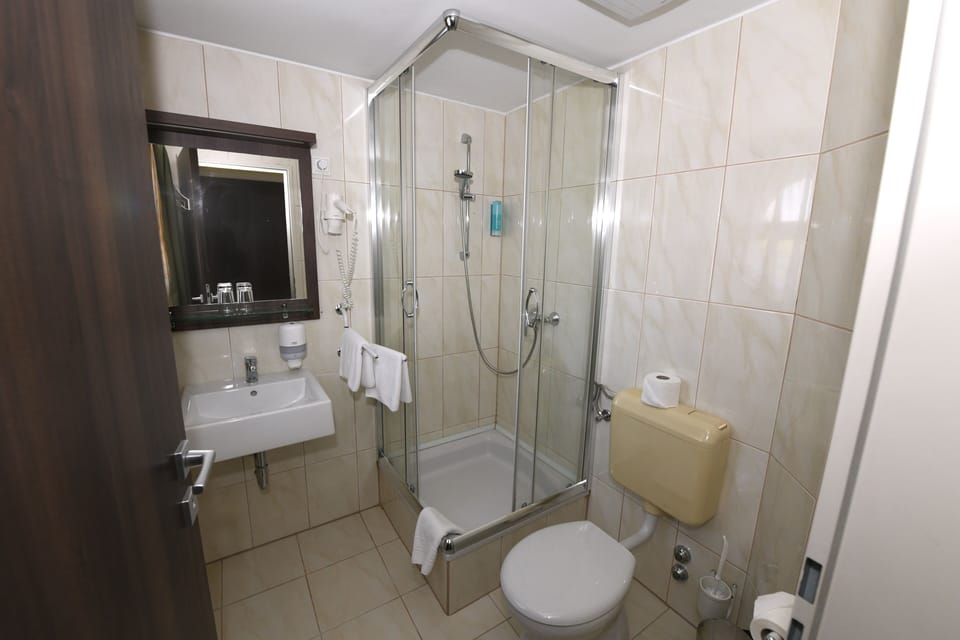 Shower, bathrobes, towels, soap