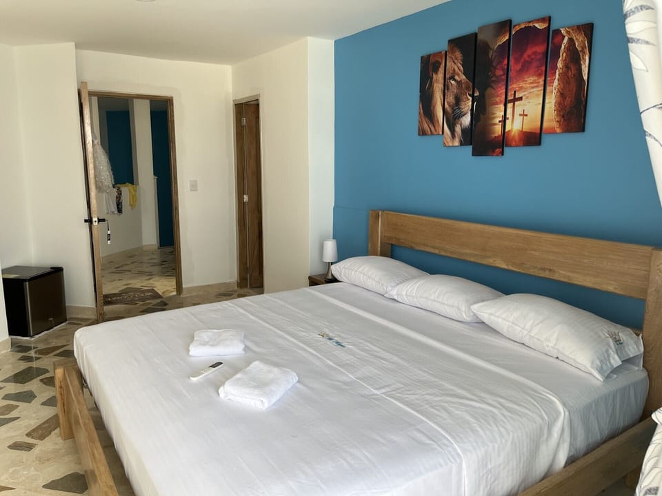 Deluxe Double Room | Minibar, individually decorated, individually furnished, blackout drapes