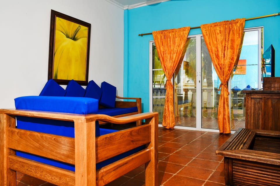 Standard Apartment | Living area | 30-inch flat-screen TV with cable channels, TV