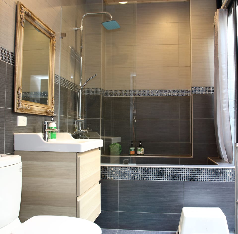 Double Room (Star Sky) | Bathroom | Shower, hair dryer, slippers, towels