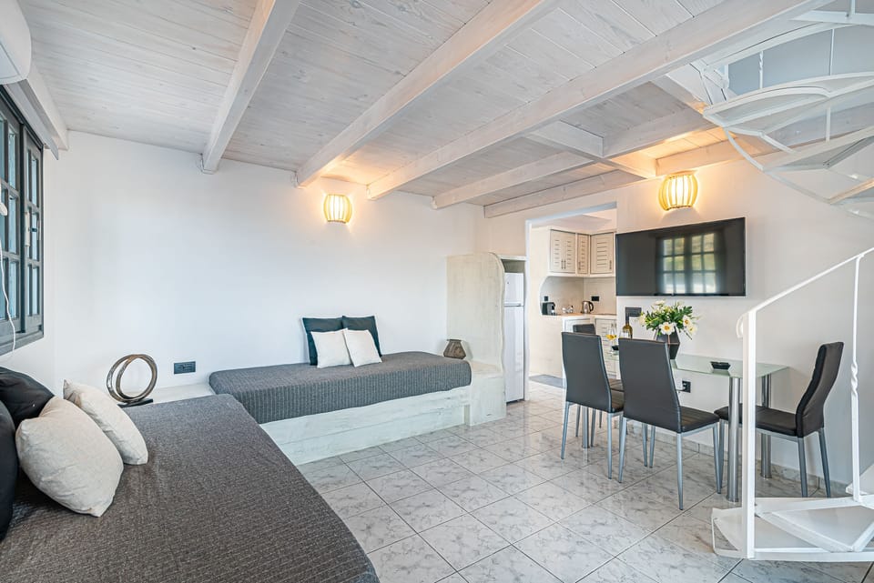 Deluxe Loft | Living area | Smart TV