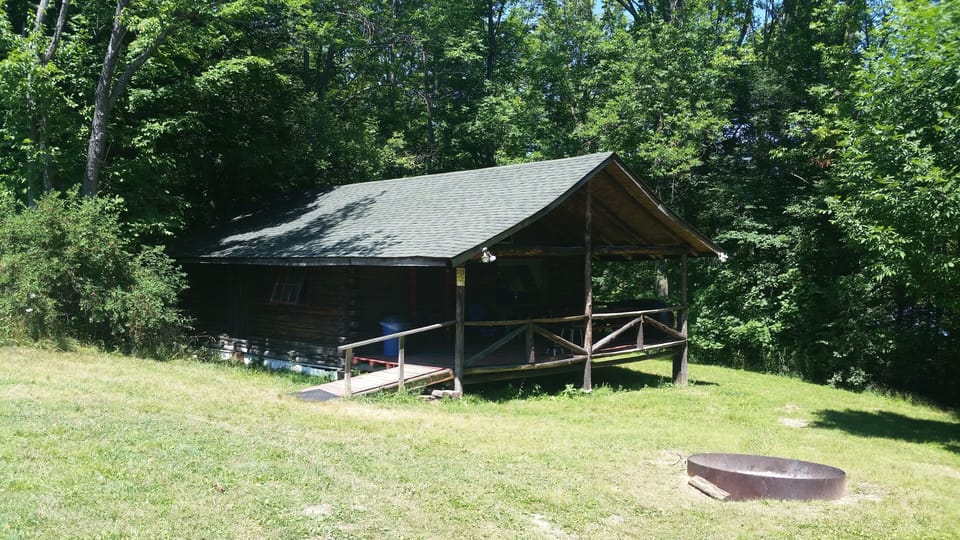 A campfire area infront of cabin!