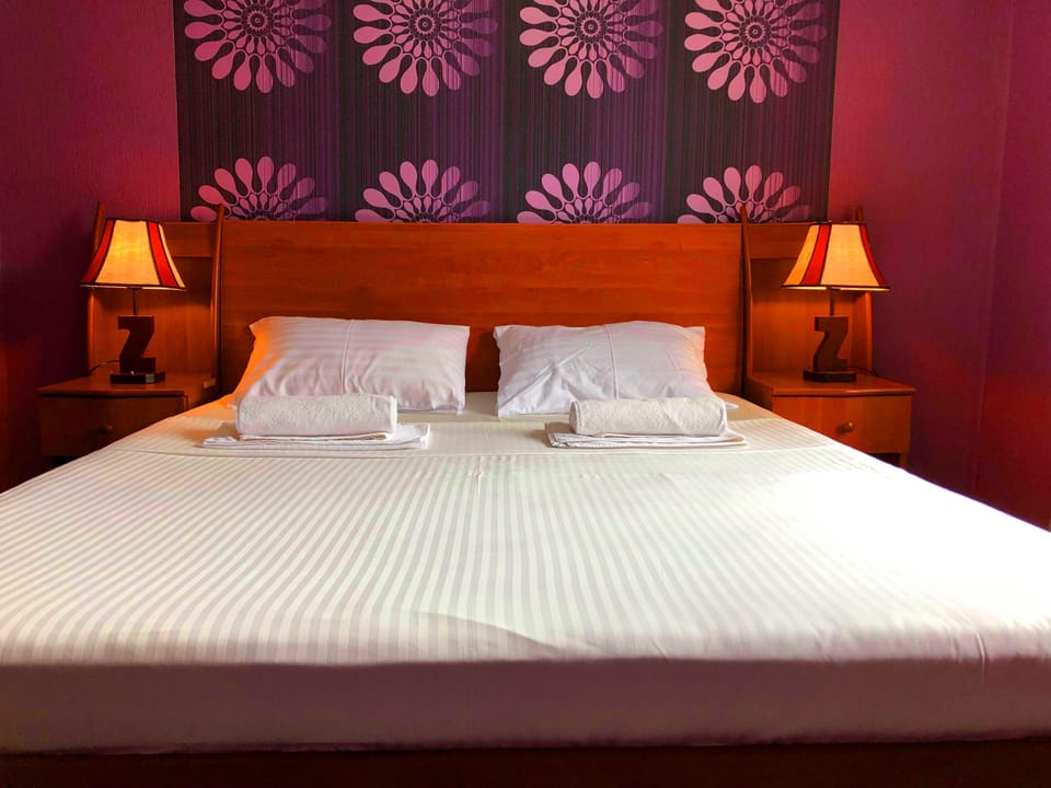 Down comforters, Select Comfort beds, in-room safe, desk
